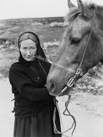 OLD WOMAN WITH HORSE